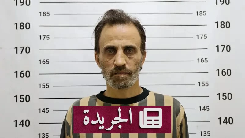 صورة أرشيفية تظهر اعتقال أحد المسؤولين السابقين في سورية بتهمة التورط في انتهاكات حقوق الإنسان بمدينة درعا